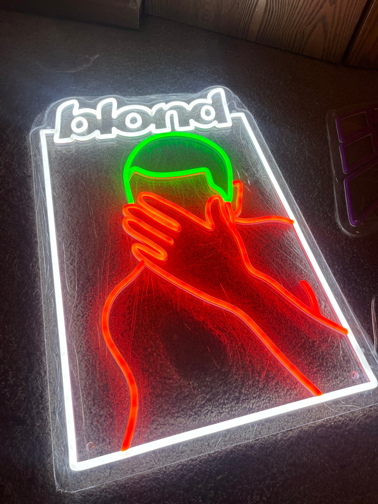 “BLONDFACE” NEON MOUNTED WALL SIGN